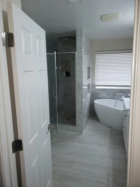 Bathroom remodeling project photo showing shower, tile or vanity work