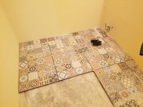 Flooring installation project photo showing LVP, tile or finished floor detail